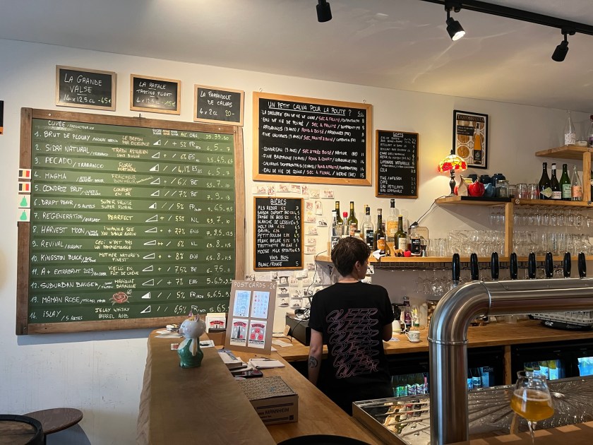 The cider bar and its chalkboard of drinks
