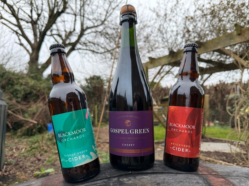 Three bottles of cider from Gospel Green and Blackmoor Orchards